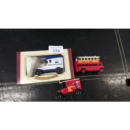 274 - Mixed lot of three model vehicles. Includes an Oxford Die-Cast boxed 