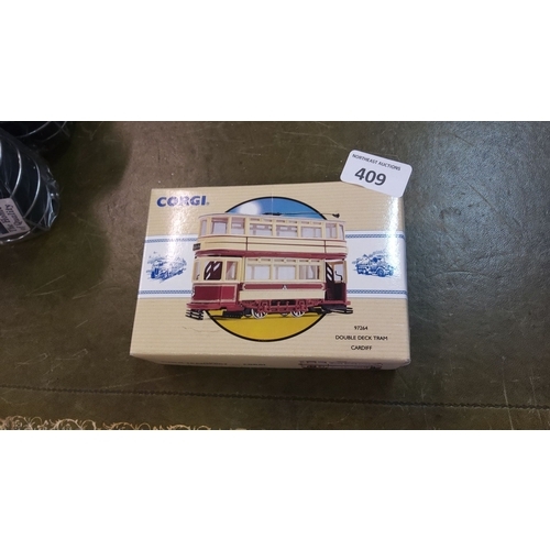 409 - Corgi 97264 Double Deck Tram model in original packaging, featuring the Cardiff tram design.