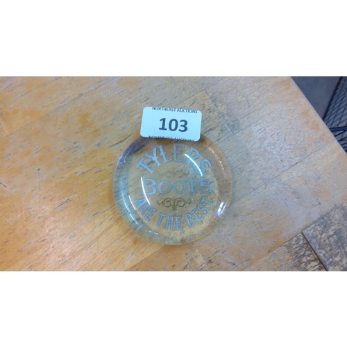 103 - Vintage glass paperweight. Circular form, clear glass. It features an inscription, 
