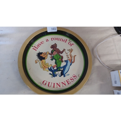 161 - Vintage 1950s Guinness round serving tray featuring colorful animal characters and 