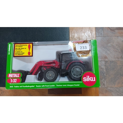 233 - Siku Farmer 1:32 scale model tractor with front loader, model number 3653. Packaged in original box ... 