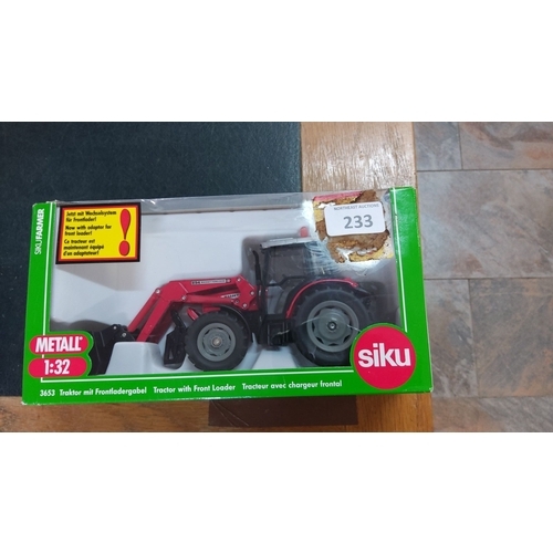 233 - Siku Farmer 1:32 scale model tractor with front loader, model number 3653. Packaged in original box ... 