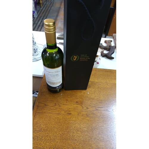 101 - Bottle of Sauvignon Blanc Côtes de Gascogne white wine with a branded black gift bag.(Dail Eireann p... 