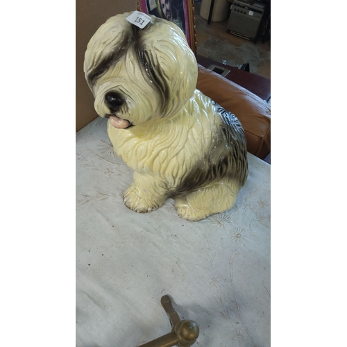 151 - Vintage dulux ceramic dog figurine in a seated position, featuring a shaggy-coated dog with detailed... 