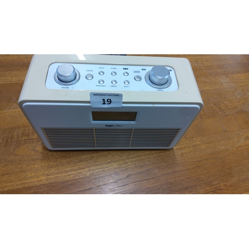 19 - Bush Classic radio with digital display and control buttons, beige and white housing, volume and tun... 