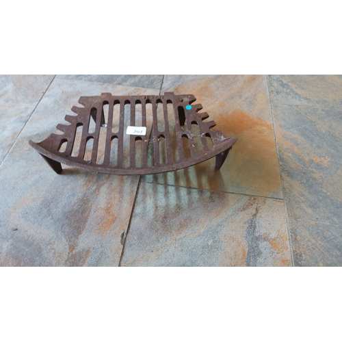 207 - Antique cast iron fire grate with curved slotted design. Sturdy construction and rust patina typical... 