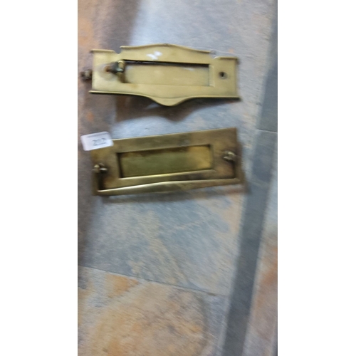 212 - Pair of brass mail slots with a classic design.