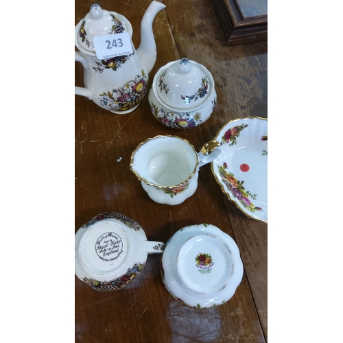 243 - Royal Tudor ware tea set featuring floral designs with gold rims. Old Country Rose sugar bowl, cream... 