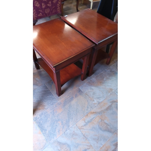 254 - Pair of mahogany side tables with fluted legs and lower shelves.