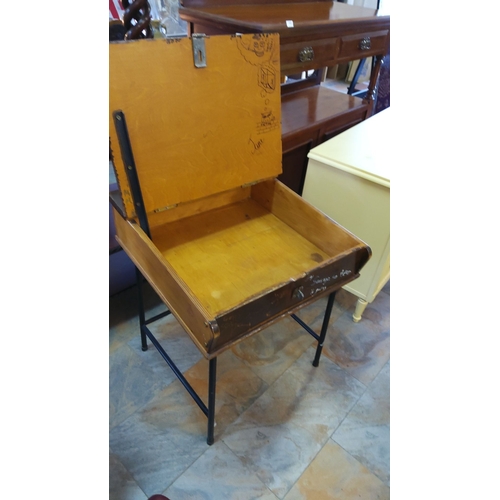 259 - Mid-century modern school desk with a lift-top lid and a light wood interior. Features a locking mec... 