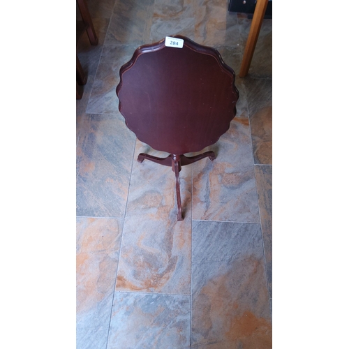 284 - Circular mahogany tilt-top tea table with scalloped edge and tripod base. Approximate Period: 19th C... 