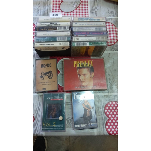 310 - Mixed lot of 17 cassette tapes featuring various artists. Includes Elvis Presley, AC/DC, Tina Turner... 