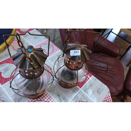 311 - Pair of vintage copper and glass hurricane lanterns, with perforated tops and decorative hanging cha... 