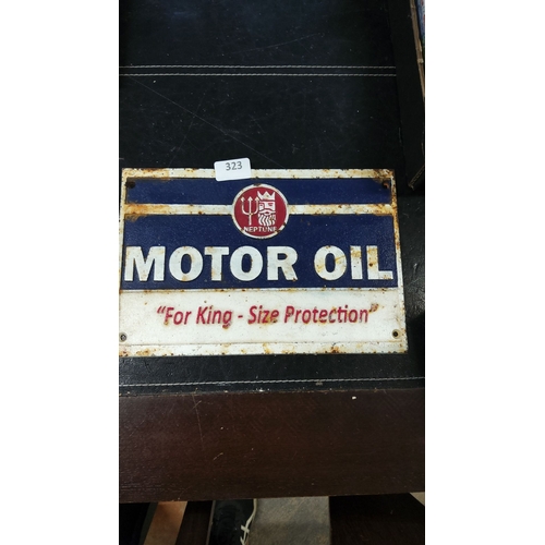 323 - Vintage Neptune Motor Oil cast iron sign, featuring trident and king imagery with slogan 