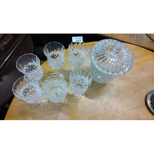 327 - Set of six cut crystal wine glasses with a matching lidded crystal Ice Bucket.