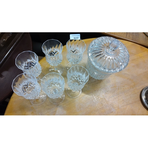 327 - Set of six cut crystal wine glasses with a matching lidded crystal Ice Bucket.