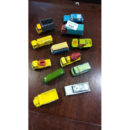 330 - Lot of 12 vintage die-cast toy vehicles including trucks, vans, and buses. Various colors and styles... 