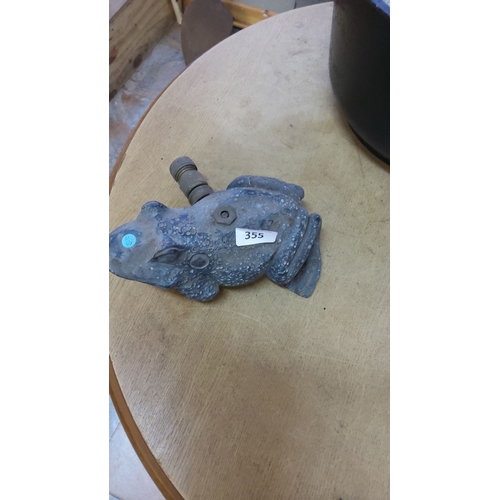 355 - Vintage cast iron frog-shaped garden spigot with detailed texture.