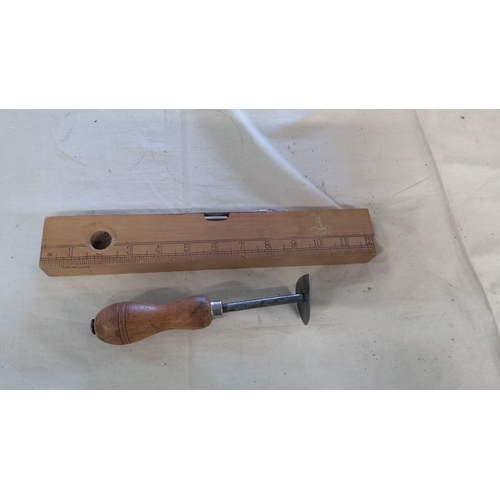 37 - Vintage wooden carpenter's spirit level and an edge marking tool with wooden handle and metal sectio... 