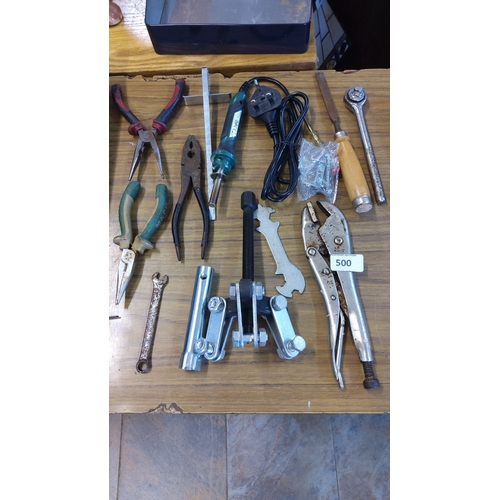 500 - Mixed lot of assorted tools, including pliers, wrenches, files, a ratchet, a puller, and a soldering... 