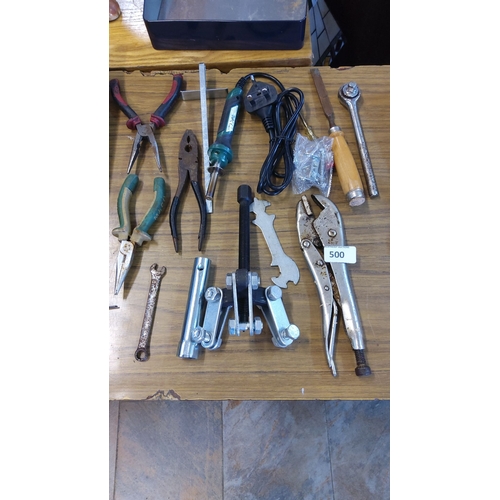 500 - Mixed lot of assorted tools, including pliers, wrenches, files, a ratchet, a puller, and a soldering... 