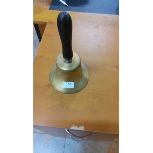 56 - Vintage brass hand bell with a wooden handle.