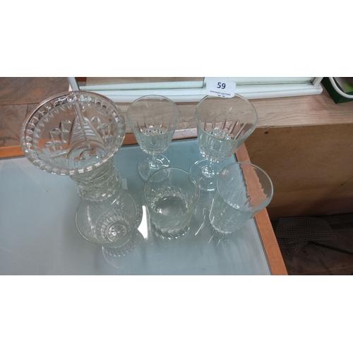 59 - Set of six cut crystal glassware, including a decorative vase and assorted stemmed glasses with intr... 