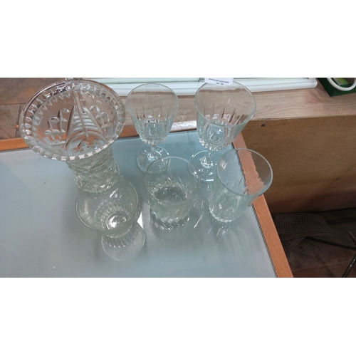 59 - Set of six cut crystal glassware, including a decorative vase and assorted stemmed glasses with intr... 