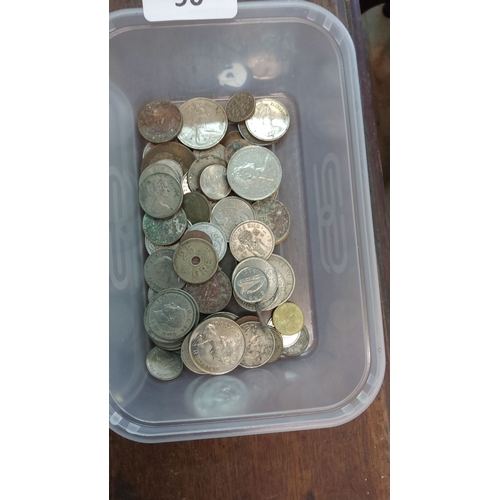 90 - Collection of assorted vintage coins, including international and commemorative pieces. Features var... 