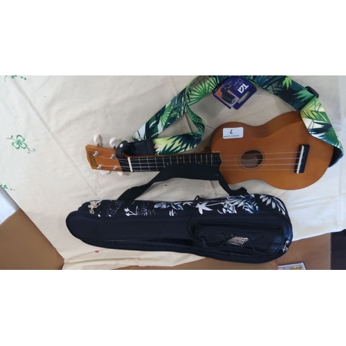 7 - Soprano Ukulele with tropical strap, TGI clip-on tuner, and padded gig bag.