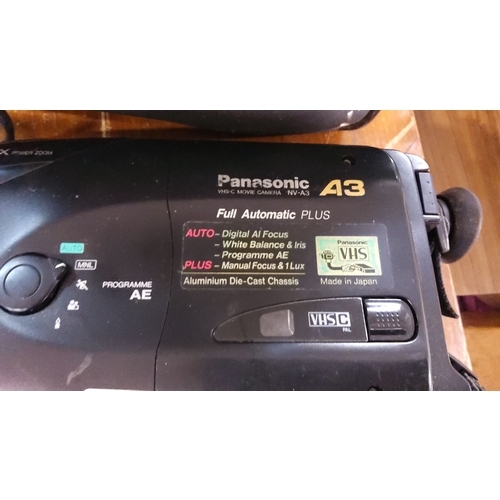 246 - Panasonic A3 VHS-C movie camera with full automatic features, 10x zoom, and die-cast aluminum chassi... 