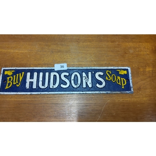 36 - Vintage cast iron sign advertising 