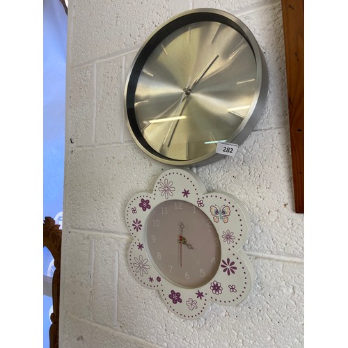 282 - Two Modern wall clocks (pwo