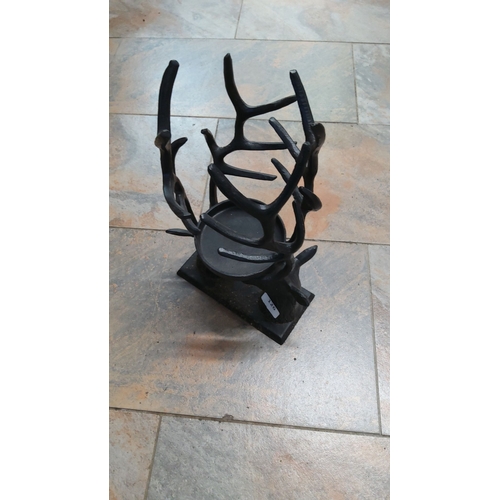 126 - Black metal antler candlestick holder by Habitat.