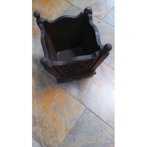 127 - Antique Arts and Crafts movement wooden planter, featuring intricate carved floral motifs.