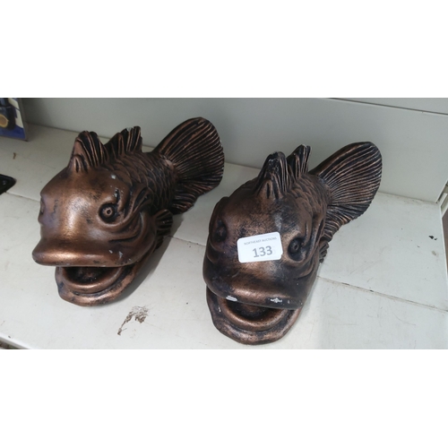 133 - Pair of concrete fish sculptures, detailed and textured.