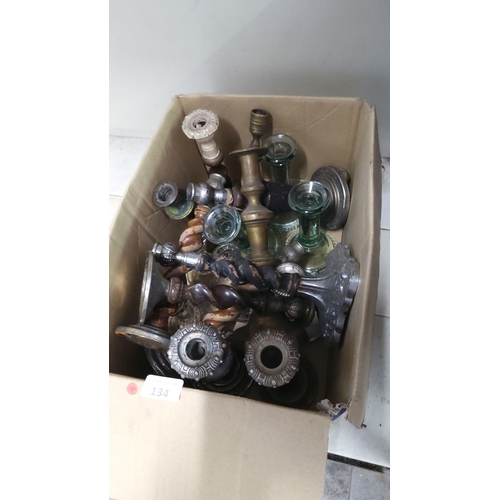 134 - Mixed lot of approximately 12 vintage candlestick holders. Made from mainly silver plate. Includes a... 