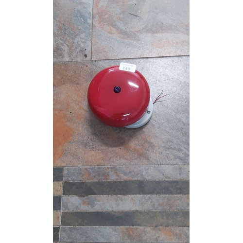 140 - Vintage industrial fire alarm bell with red metal cover.