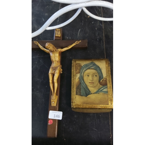 146 - Crucifix featuring detailed figure of Jesus and a small religious icon depicting a young woman in a ... 