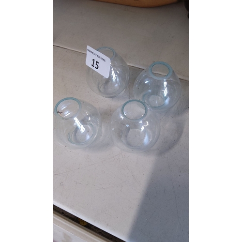 15 - Set of four clear glass light shade covers. These domed covers add elegance and functionality to any... 