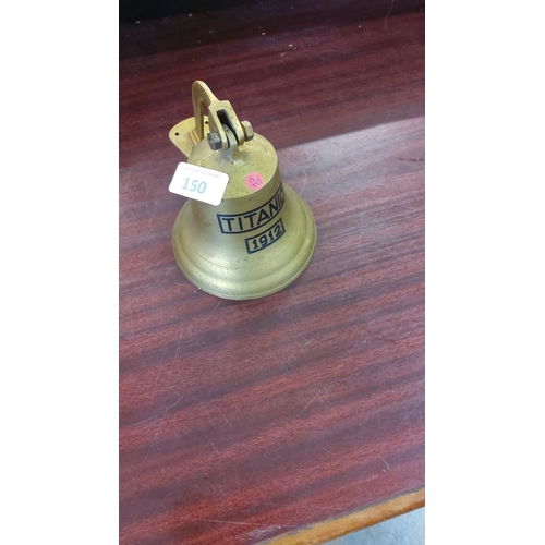 150 - Brass Titanic replica 1912 bell. Maritime memorabilia featuring an attached wall bracket. Iconic his... 