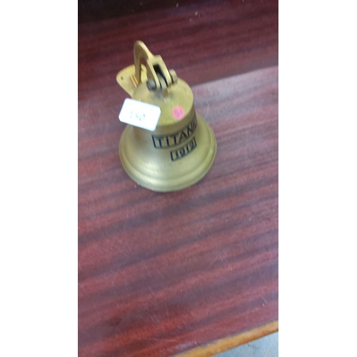 150 - Brass Titanic replica 1912 bell. Maritime memorabilia featuring an attached wall bracket. Iconic his... 