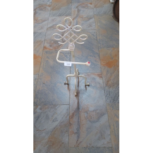 152 - Vintage white wrought iron toilet roll  stand with twisted central column and looped design top.