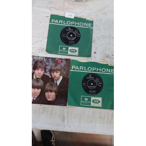 173 - The lot includes 3 Parlophone 45 RPM records by The Beatles
