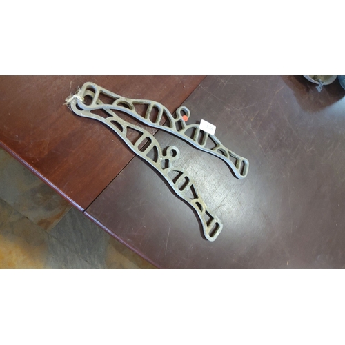 176 - Pair of antique metal clothes line brackets/ends