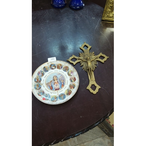 182 - This lot features a brass crucifix and a ceramic plate that depicts the Joyful Mysteries, Glorious M... 