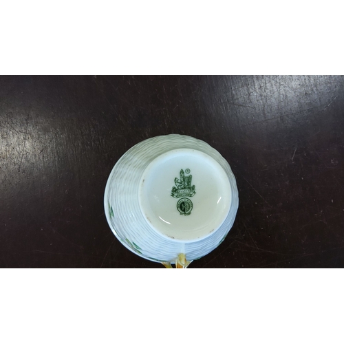 190 - Belleek 21 pce tea set with clover design, includes cups, saucers, plates, and a creamer. Marked Bel... 