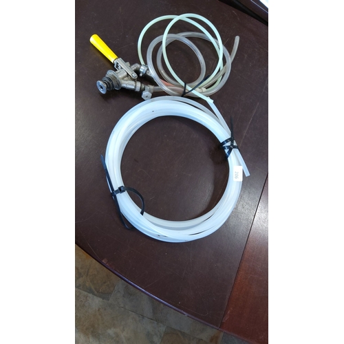206 - Draft beer keg tap with hoses and connectors, includes yellow tap handle and multiple tubing lengths... 