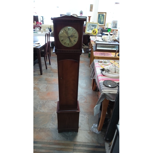 209 - Mahogany Grandfather Clock, with a brass face with Roman numerals. Crafted in a traditional style. T... 