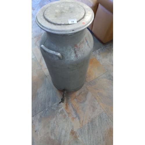 23 - Antique aluminum milk can with spout and handles, featuring a removable lid. Height: approximately 3... 